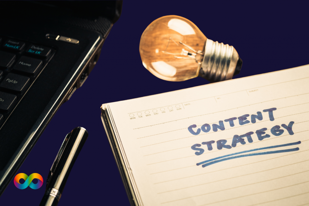 Image of a laptop and pen with a note pad that says content strategy 